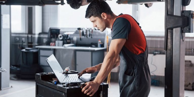 Mechanic On Laptop