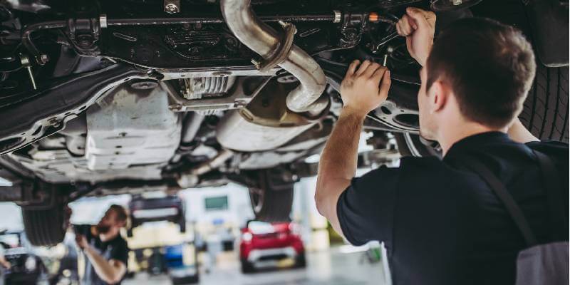 Car In Garage Being Fixed